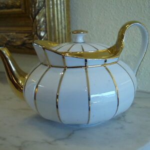 Meissen 19th Century Diminutive Tea Pot with Gold Trim.