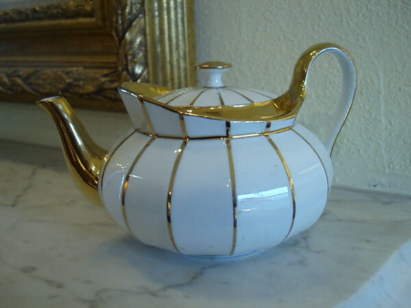 Meissen 19th Century Diminutive Tea Pot with Gold Trim.